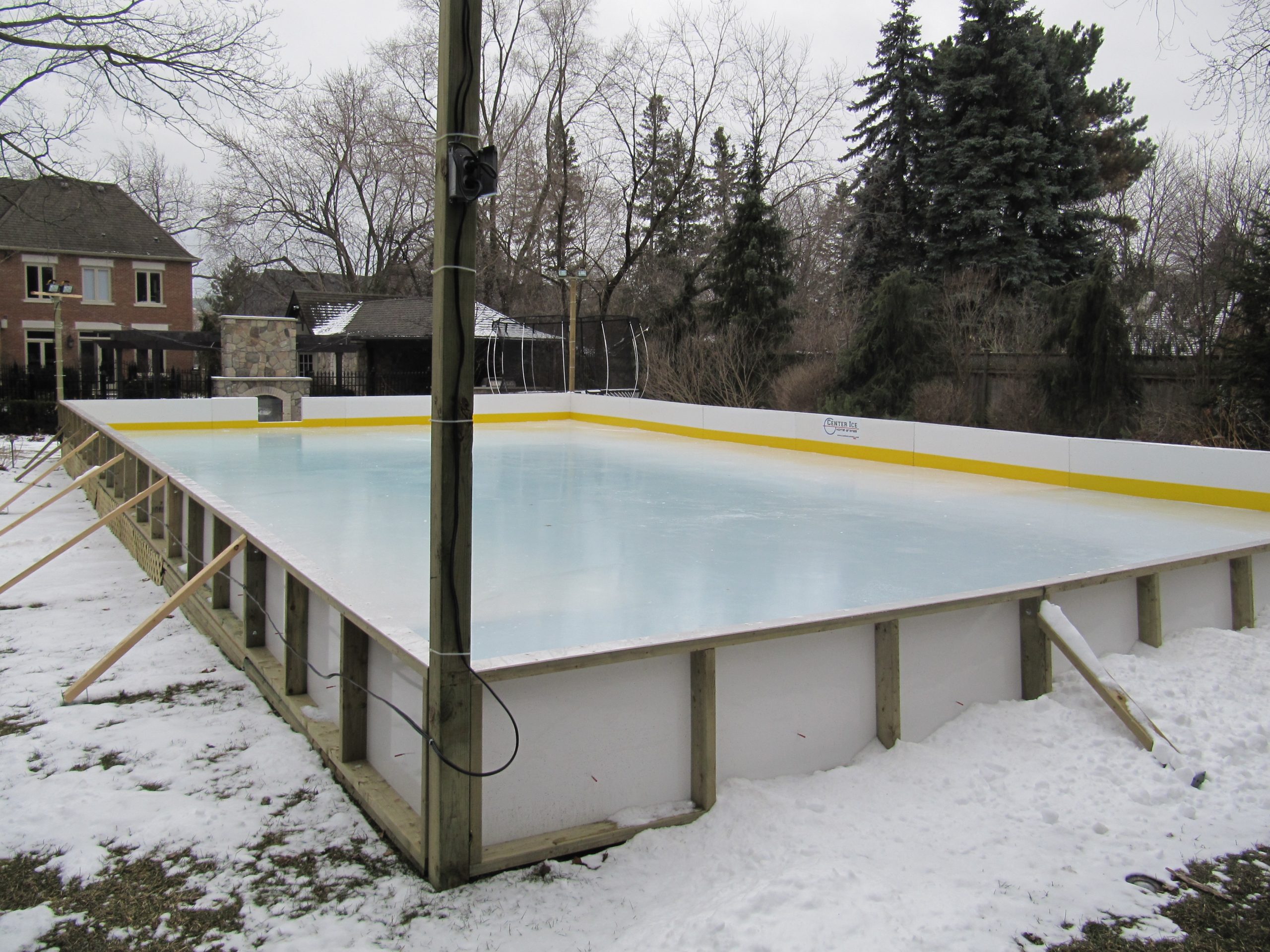 Family skating on pool rink